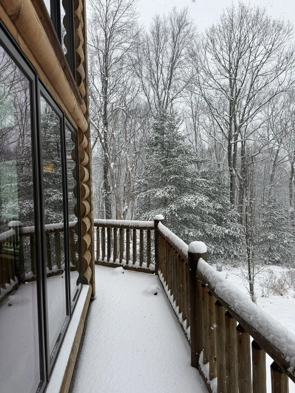 Fresh snow on the deck beside the great room windows